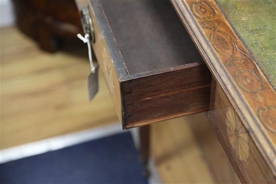 A George III marquetry inlaid satinwood writing table, W.3ft 3in. D.2ft 2in. H.2ft 7in.